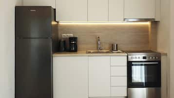 Appartamento familiare | Cucina privata | Frigorifero, forno, fornetto tostapane, pentole/stoviglie/utensili