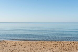 On the beach, sun-loungers, beach towels
