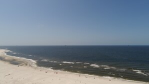 A beach with a sandy shore and the ocean. - Dauphin Island Beach Club 307 Beautiful views!! (Dauphin Island)