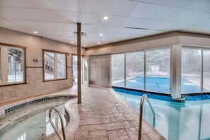 Swimmers can enjoy a clear view of the pool from the surrounding walkway.