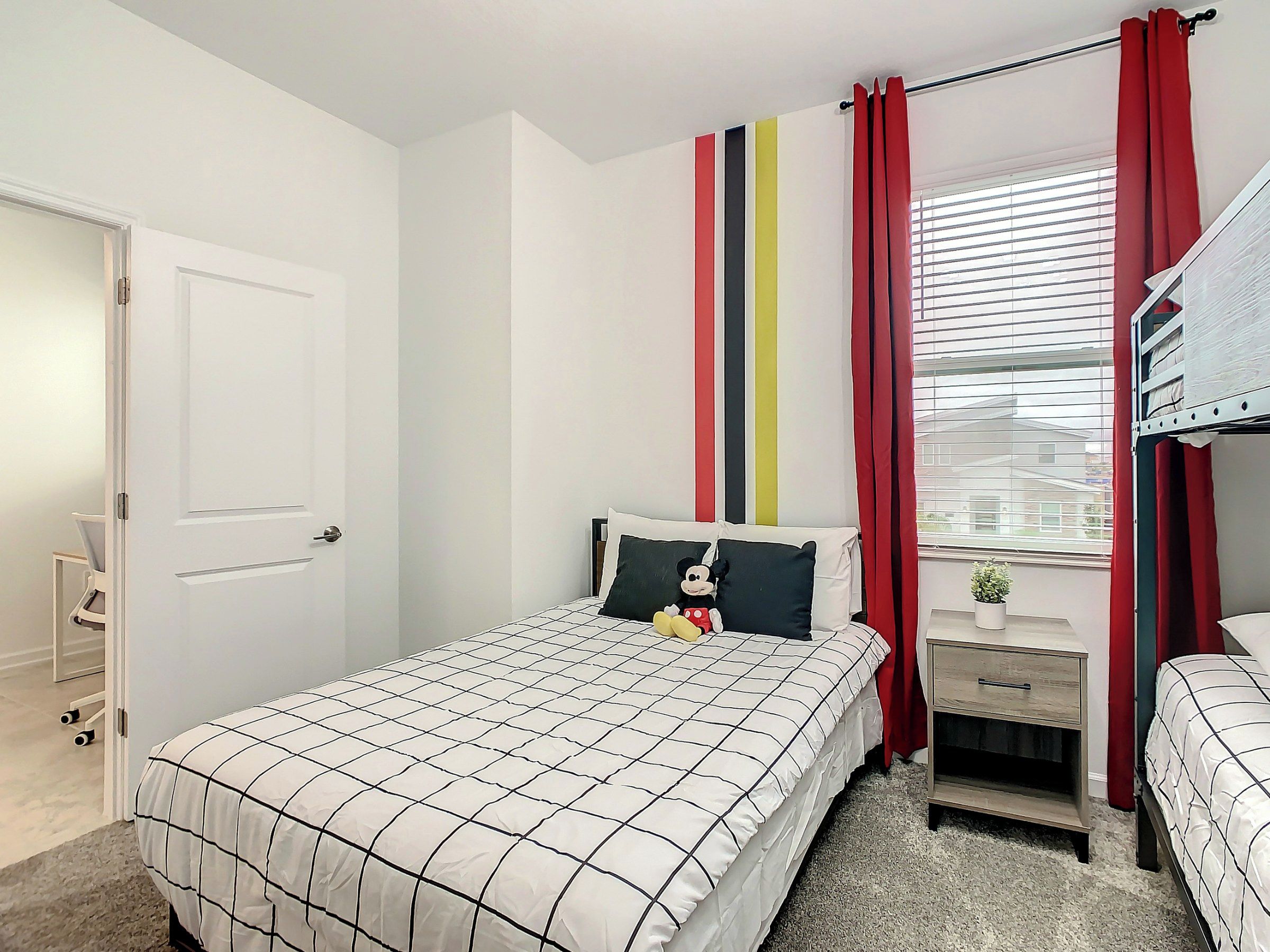 Bright Themed Bedroom with Bunk Beds and Playful Accents