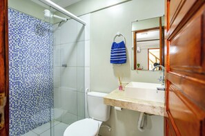 Shower, towels, soap, toilet paper