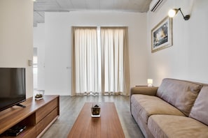 Deluxe-Apartment, 2 Schlafzimmer | Wohnbereich