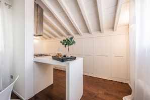Enjoy cooking in this kitchen with a gas stove and ample storage.