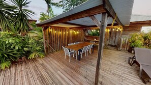 Outdoor dining - Gîte Baobab 1: Beautiful pool area with panoramic view (Sainte-Anne)