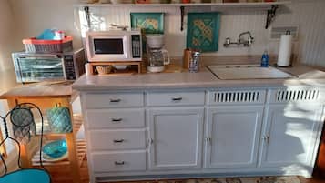 Fridge, microwave, coffee/tea maker, toaster