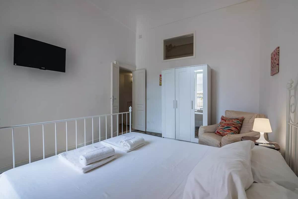 Family Apartment | 1 bedroom, down comforters, desk, laptop workspace
