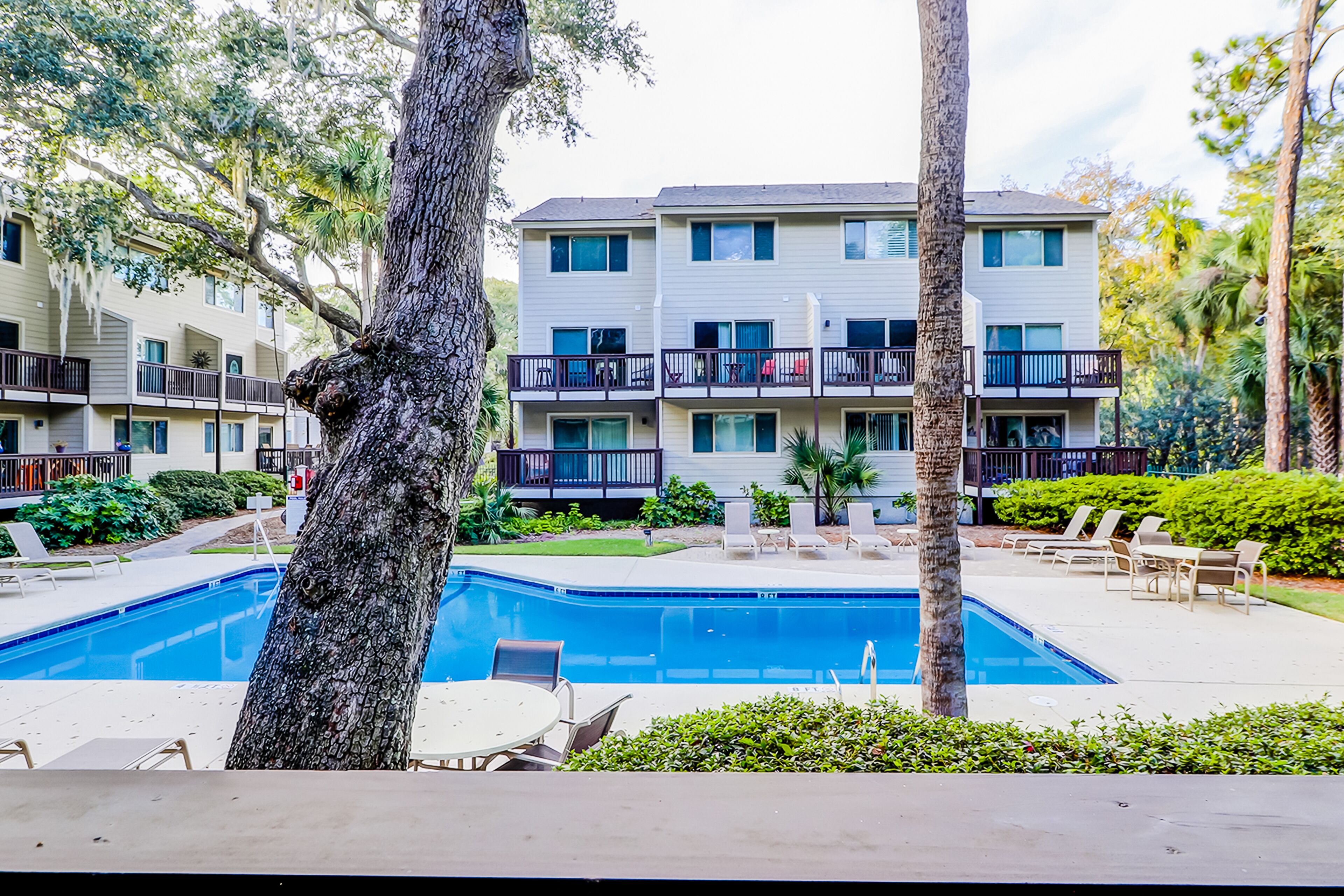Renovated Coligny condo with pool, deck, & AC - walk to beach, shops, & dining