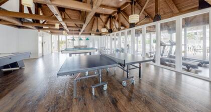Gulf-view condo with balcony & on-site pool/hot tub/tennis/gym/game room access