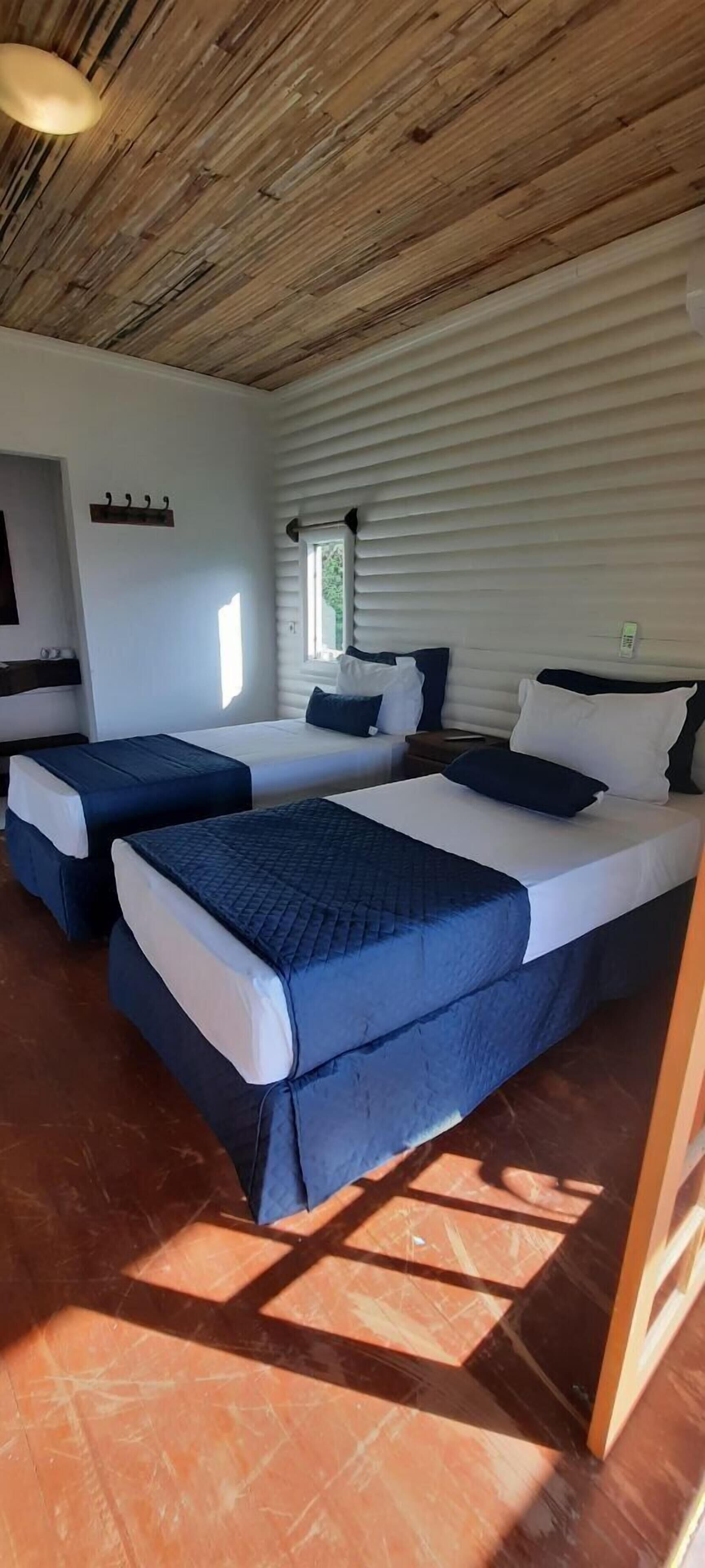 Desk, laptop workspace, free WiFi, bed sheets