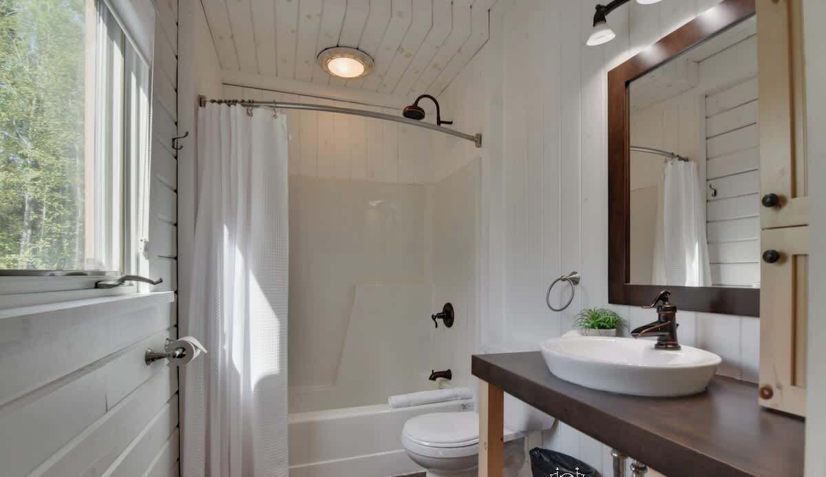 Bathtub, hair dryer, towels