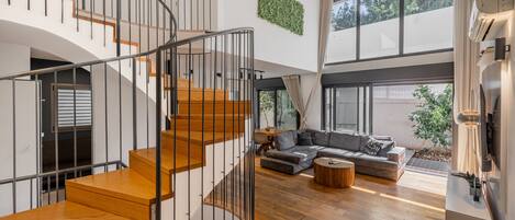 Luxury Apartment | Living area | 42-inch Smart TV with digital channels, TV, Netflix