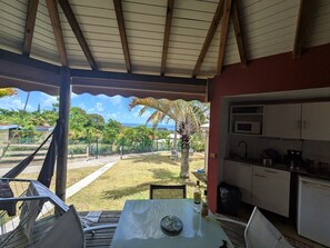Outdoor dining - Baobab 4 Vacation Rental – Stay with Ocean Views, Pool, Deck, and Dojo (Sainte-Anne)