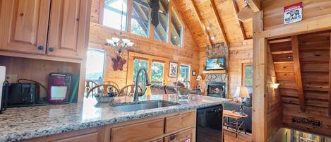 Cabaña, varias camas, hidromasaje, vista a la montaña | Interior