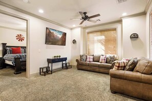 Condo, Multiple Beds, Patio, Mountain View (Coral Springs Getaway) | Living area | 42-inch flat-screen TV with digital channels, fireplace - Coral Springs Getaway - Outdoor and Indoor Heated Pool - Close to Zion National Park (Hurricane)