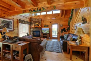 Cabin, Multiple Beds, Hot Tub, Mountain View (A Stone's Throw) | Living area | 40-inch TV with cable channels, fireplace - A Stone's Throw (Pigeon Forge)