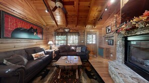 Cabin, 1 King Bed with Sofa bed, Fireplace | Living area | 40-inch TV with cable channels, fireplace - Snoozers Hollow (Sevierville)