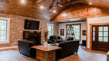 40-inch TV with cable channels, fireplace