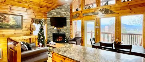 40-inch TV with cable channels, fireplace