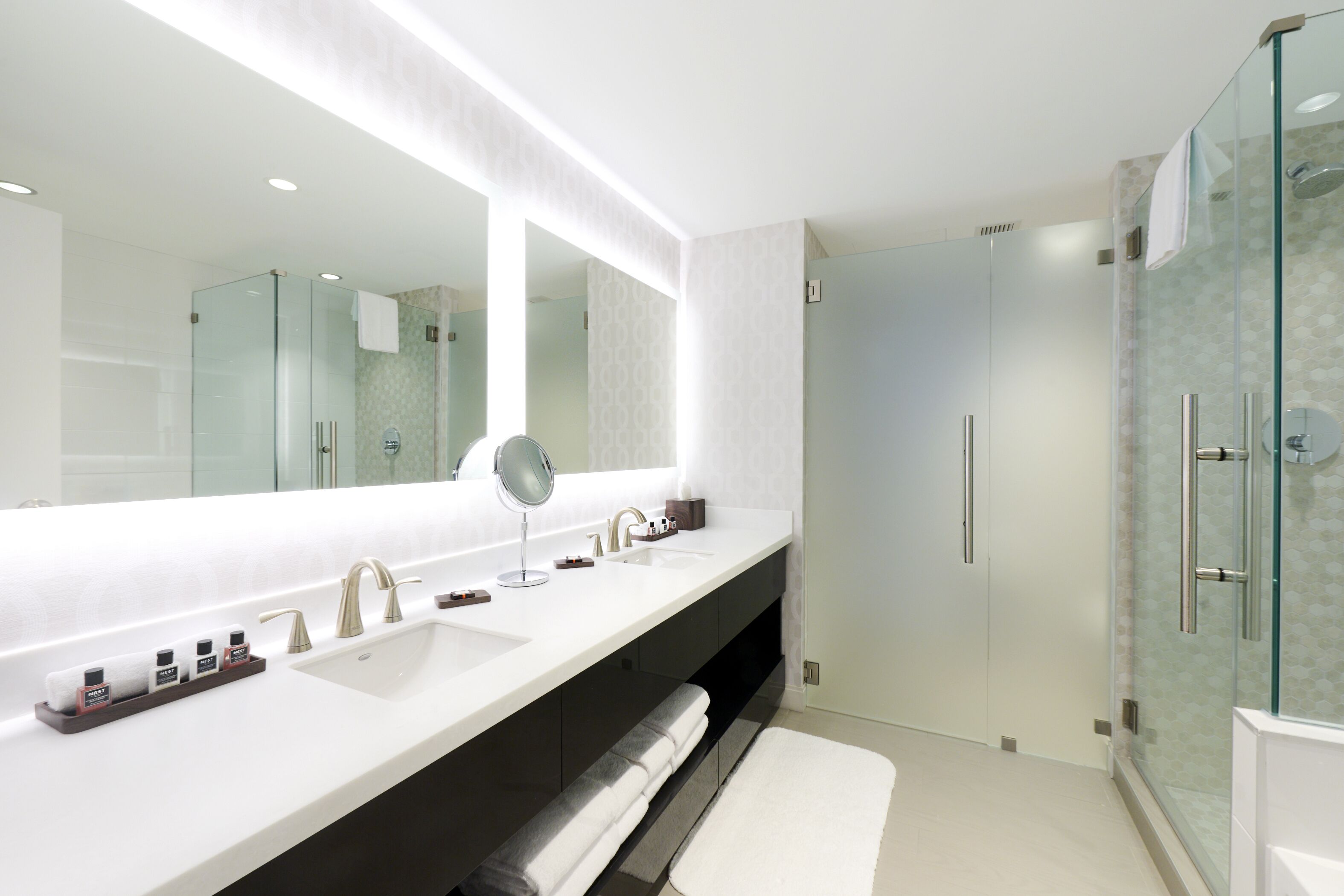 Designer toiletries, hair dryer, bathrobes, towels