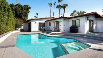 Outdoor pool, pool umbrellas, pool loungers