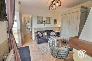 TV, fireplace, books