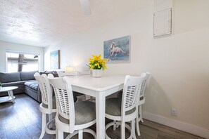 Dining - Family-friendly LARGE 2-bed, 1-bath ground-floor unit near Indian Rocks Beach. Sleeps seven with full kitchen, WiFi, smart TV, beach gear, and direct pool access. A bright, comfortable base for easy sand days and sunset evenings. (Indian Rocks Beach)