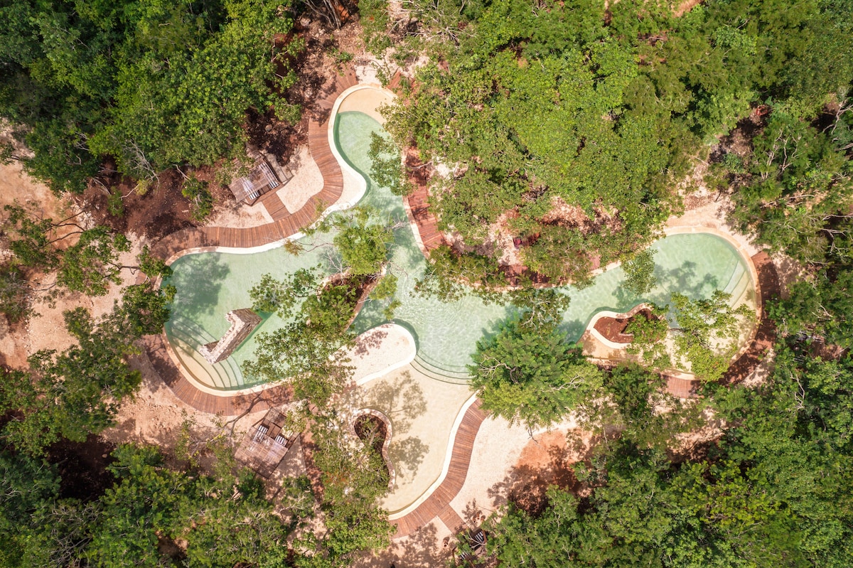 aerial view of Oriundo Luxury Nature Villas pool area