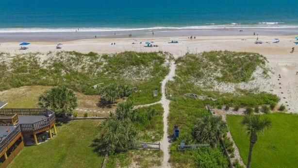 An aerial view of a beach with a pathway leading to a building with a deck. - Blue Ocean ~ Pet Friendly ~ One house off the Beach! (Saint Augustine)
