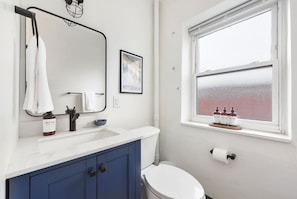 Hair dryer, towels, soap, shampoo