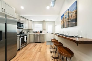 Fridge, microwave, oven, stovetop - ★ HostWise Stays ★ Off-Street Parking, <1 block from Butler, Patio, Great Space! (Pittsburgh)
