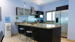 Condo, 3 Bedrooms | Private kitchen - Paseo Del Sol Surf 203 3 Bedroom Condo by RedAwning (Playa del Carmen)