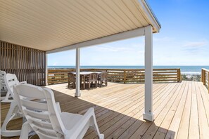 Outdoor dining - Cheek to Cheek at Ocean Isle Beach, Ocean front home with great views and new deck! (Ocean Isle Beach)