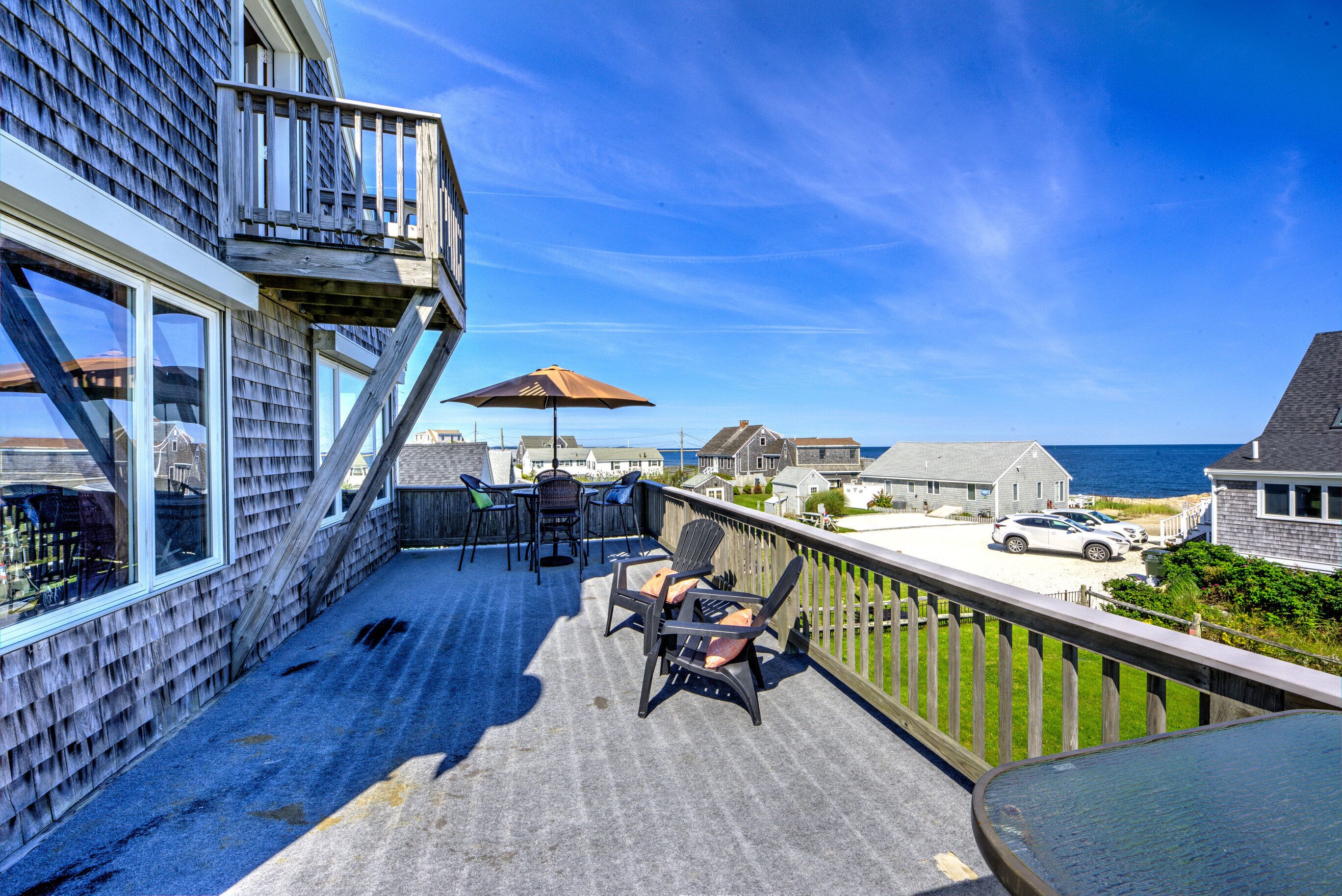 Post and Beam home with beautiful views of Cape Cod Bay, just one house back from the water