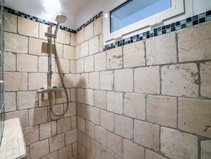 Shower, hair dryer, towels, soap