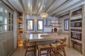 Villa | Private kitchen | Dining tables