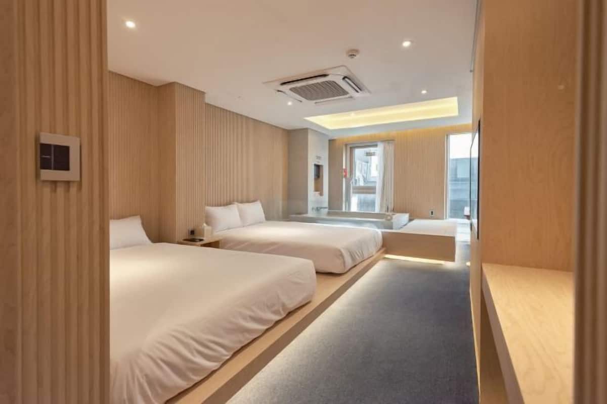 Blackout curtains, iron/ironing board, free WiFi, bed sheets