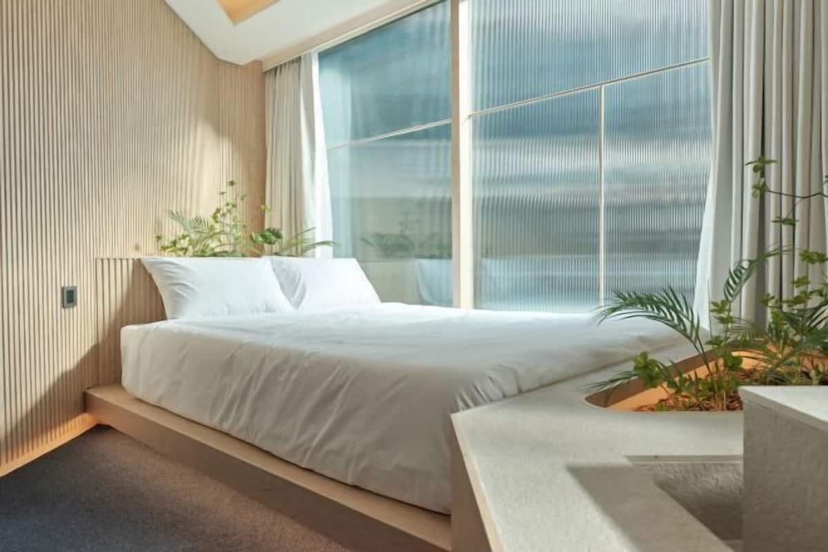 Blackout curtains, iron/ironing board, free WiFi, bed sheets