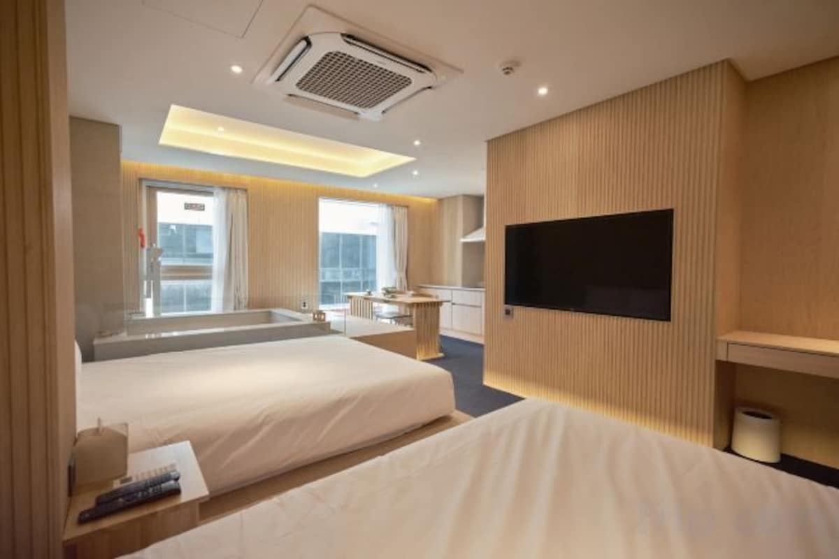 Blackout drapes, soundproofing, iron/ironing board (on request)