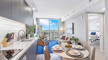 Condo, 1 Bedroom (227-3104) | Living area | 40-inch TV with cable channels