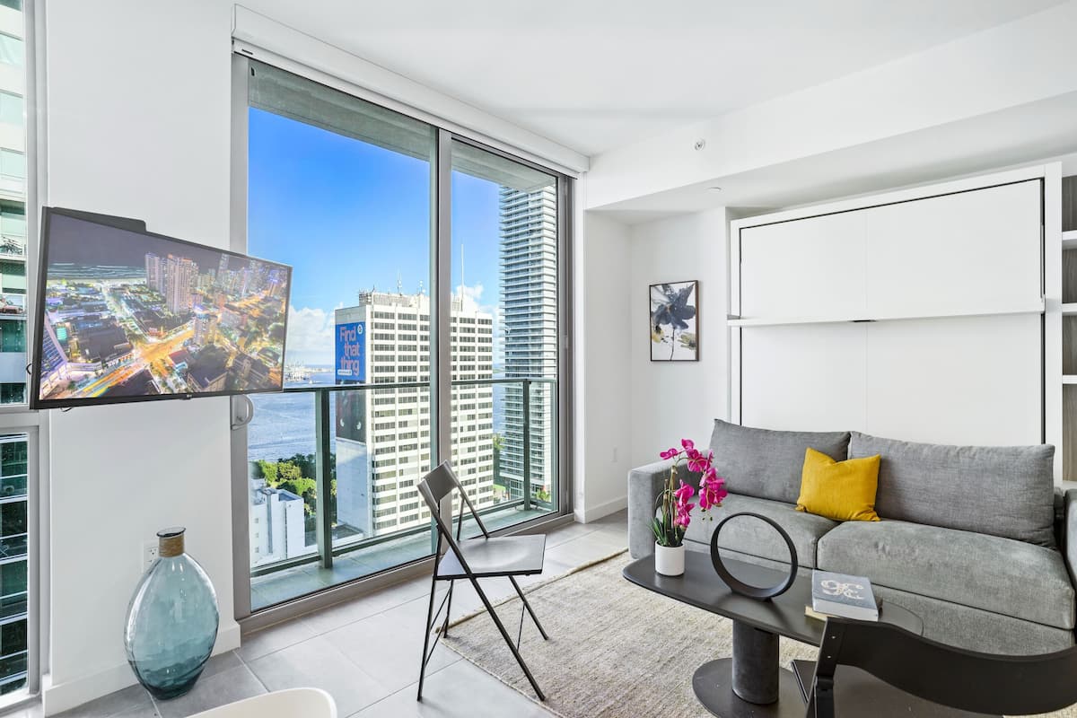 Studio (227-2913) | Living area | 40-inch TV with cable channels