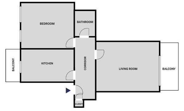 A floor plan with a bedroom, bathroom, kitchen, living room, and closet. There are balconies on two sides.