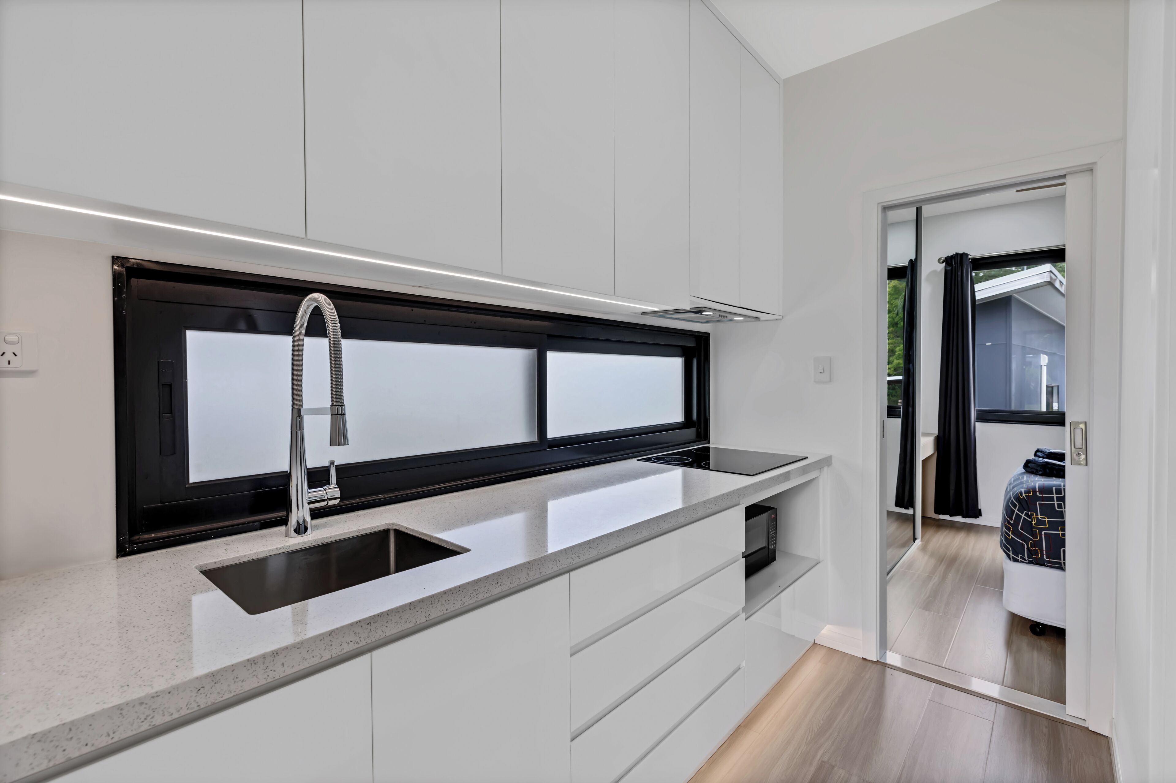 Villa | Private kitchen | Microwave, electric kettle, toaster, dining tables