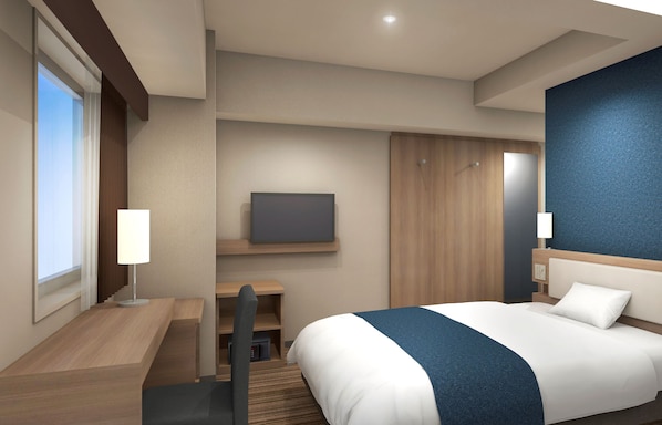 Une chambre d’hôtel moderne équipée d’un grand lit, d’un bureau, d’une chaise, d’une télévision et d’une fenêtre.