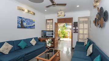 Classic Villa | Living area | Flat-screen TV