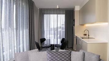 Executive Apartment, 1 Bedroom | In-room safe, desk, iron/ironing board, rollaway beds