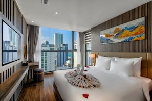 Suite | Ropa de cama hipoalergénica y minibar