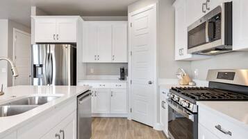 House, Multiple Beds | Private kitchen