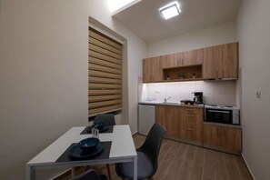 Fridge, oven, coffee/tea maker, toaster