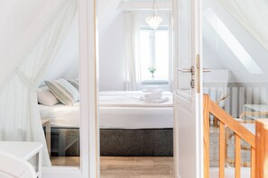 2 slaapkamers, een strijkplank/strijkijzer, gratis wifi, beddengoed